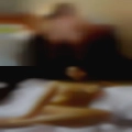 Man massaging woman
