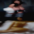 Nude woman looking